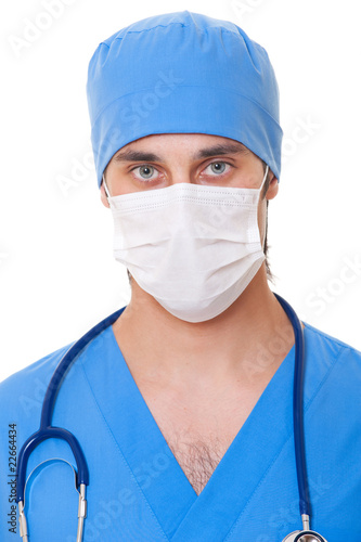 portrait of doctor in mask and blue uniform