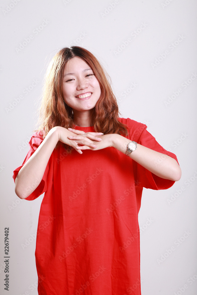 female model posing in bright red t-shirt female model posing in bright red t-shirt