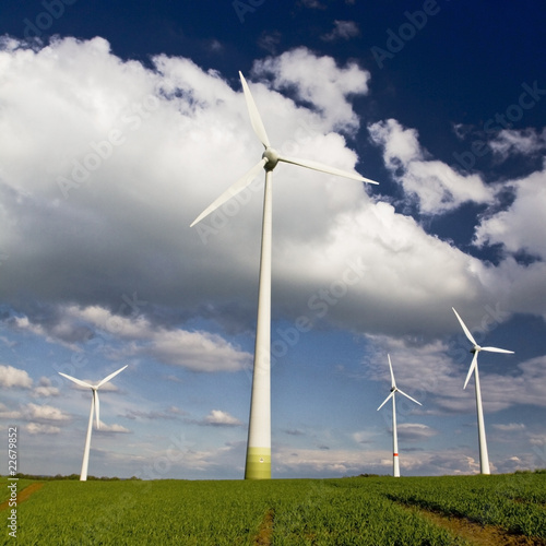 Windmills against a blue sky