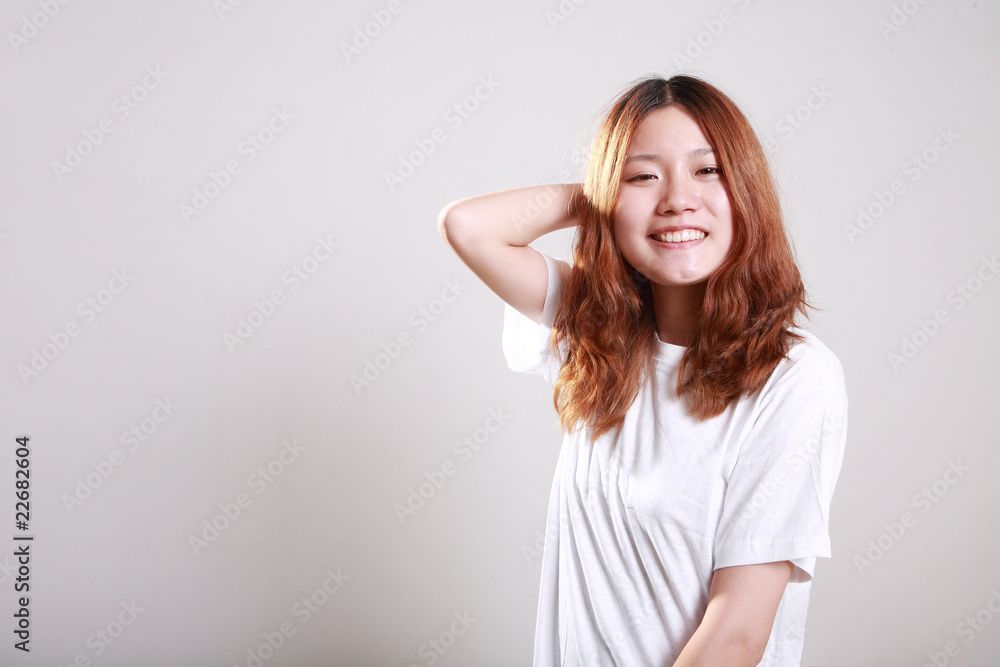 female model posing in bright white t-shirt female model posing in bright white t-shirt