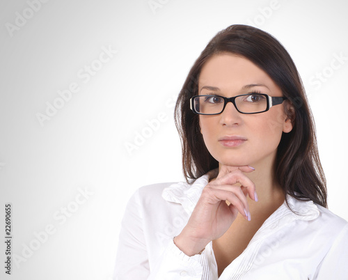 Portrait of a young business woman in dark glasses