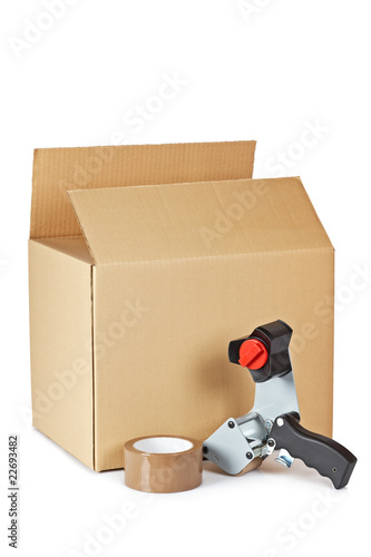 Packaging tape dispenser and shipping box photo