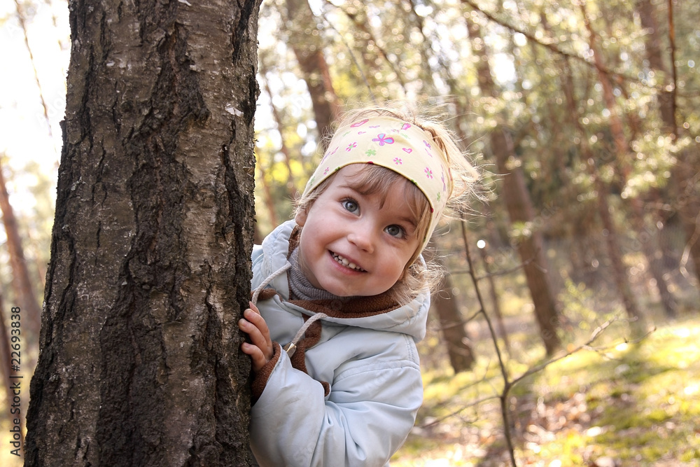 Spring girl is playing in the woods Spring girl is playing in the woods