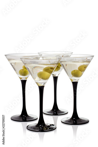 Martini with olives on a white background