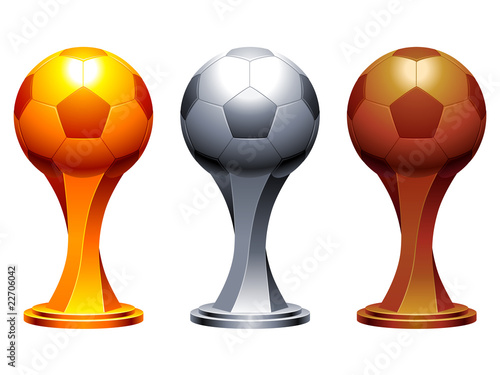 Golden, silver and bronze soccer trophy cups.