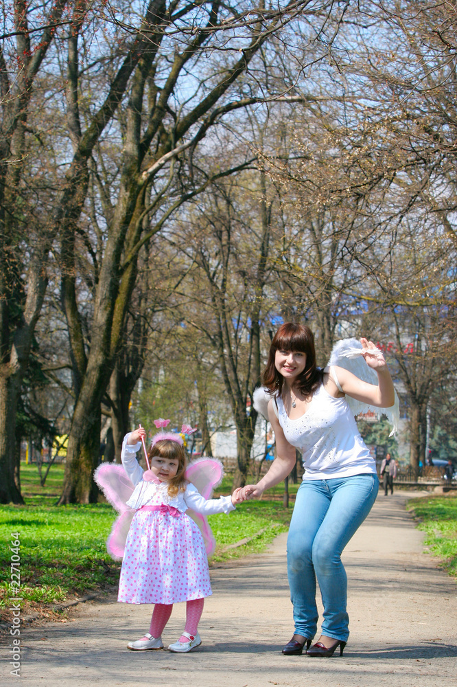 Fototapeta premium young girl and mother with wings