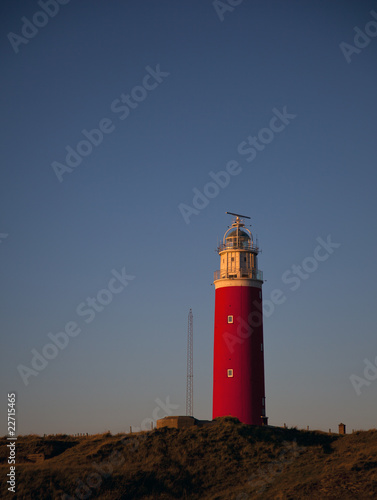 the lighthouse of texel in the evening light