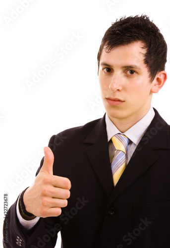 young business man showing thumbs up sign, isolated on white