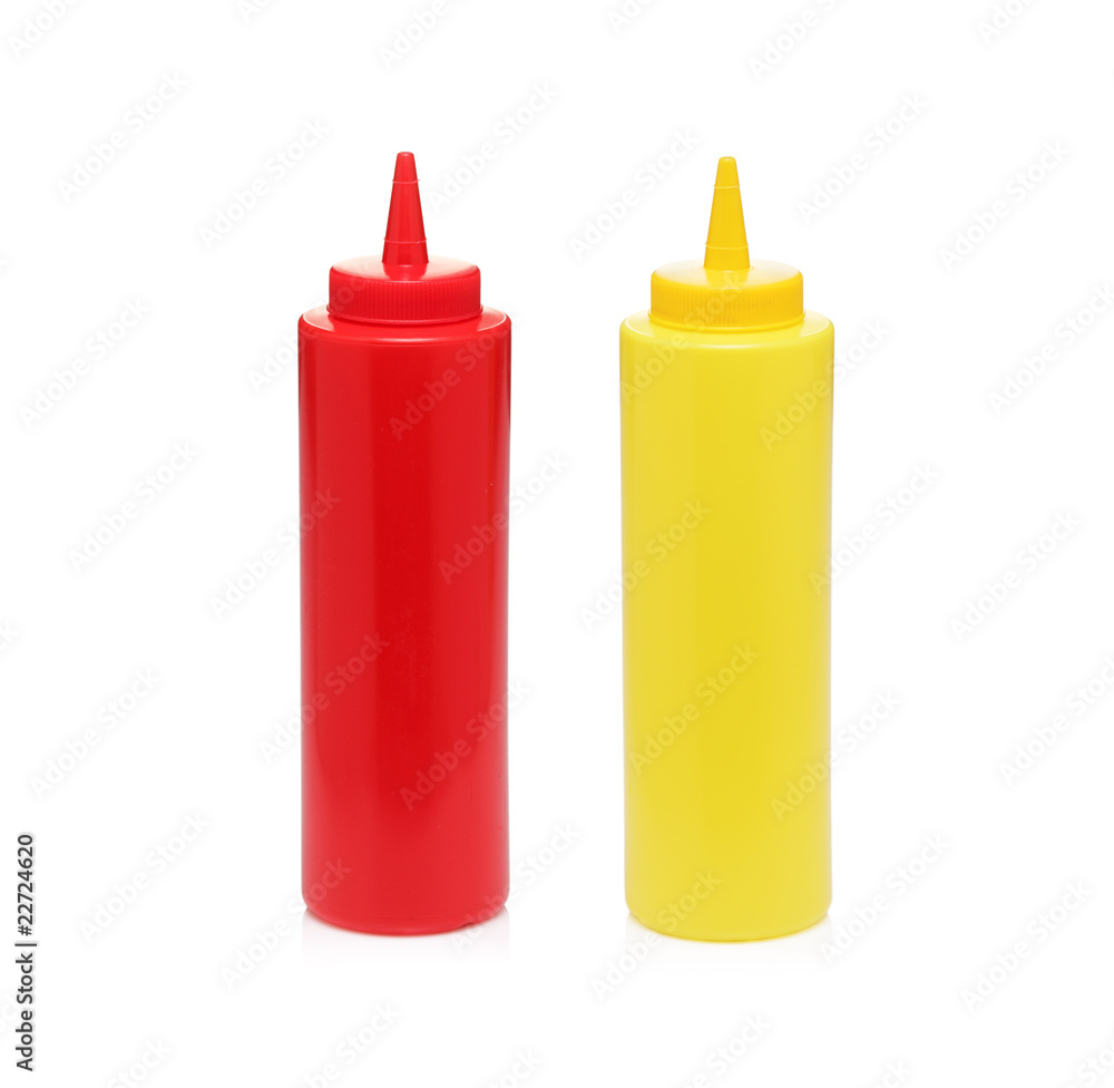 A mayonnaise and tomato ketchup bottles isolated on white A mayonnaise and tomato ketchup bottles isolated on white