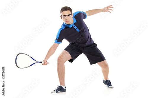 Squash player isolated on white background © Ljupco Smokovski