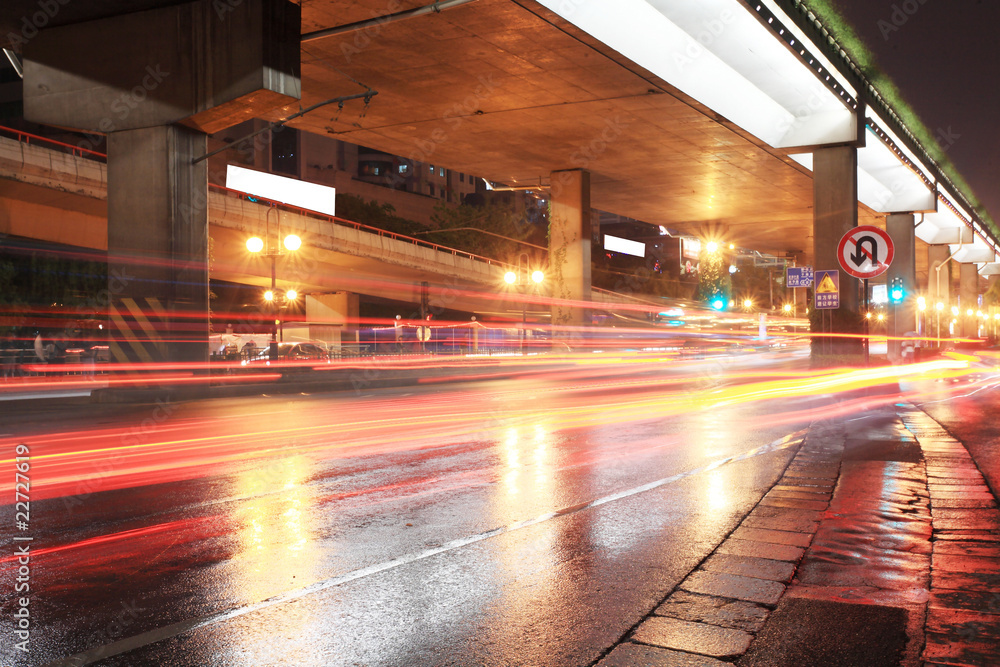 Urban night traffics view. Focus on the road. .