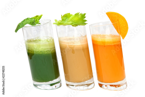fresh juices from carrot, celery and parsley in glasses