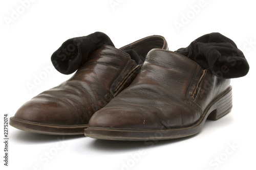 brown leather shoes and black socks cottony