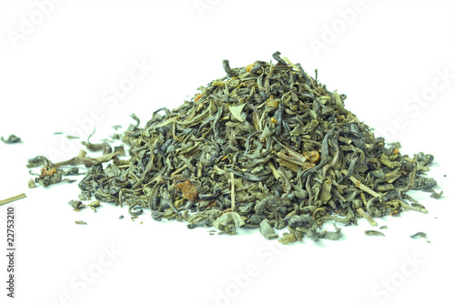 Pile of green tea isolated on white