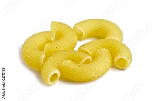 uncooked pasta tubes isolated on white background