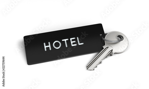 Hotel key with plastic keyring on the floor photo