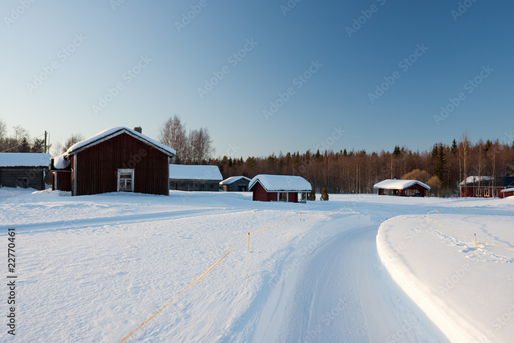 Small wooden houses in winter.