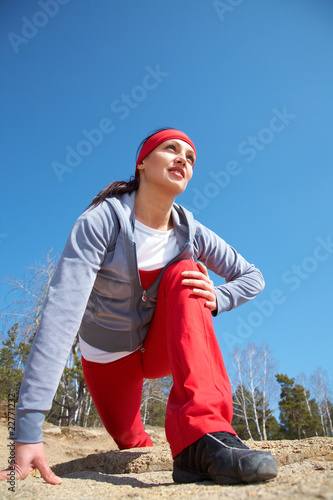 Beautiful girl engaged in sports exercises
