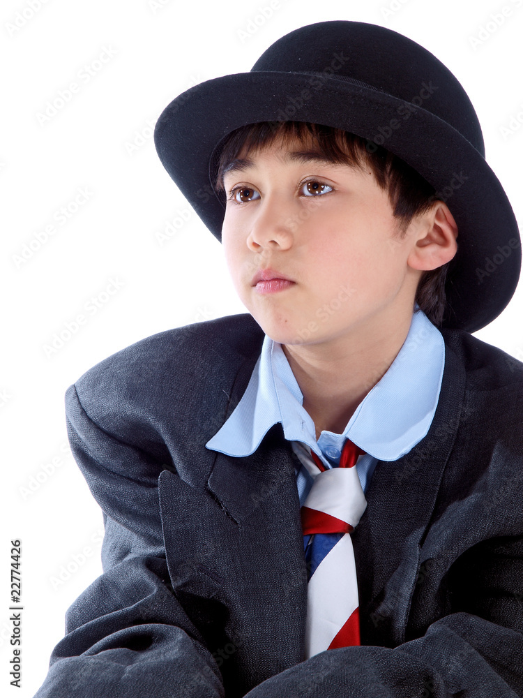 boy wearing a business suit seriously thinking of his future boy wearing a business suit seriously thinking of his future