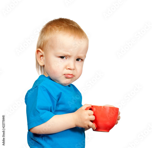 boy in  blue shirt with cup