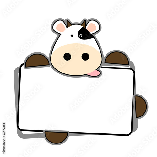Funny cow holding blank label