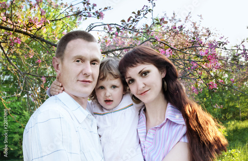 family in spring garden photo