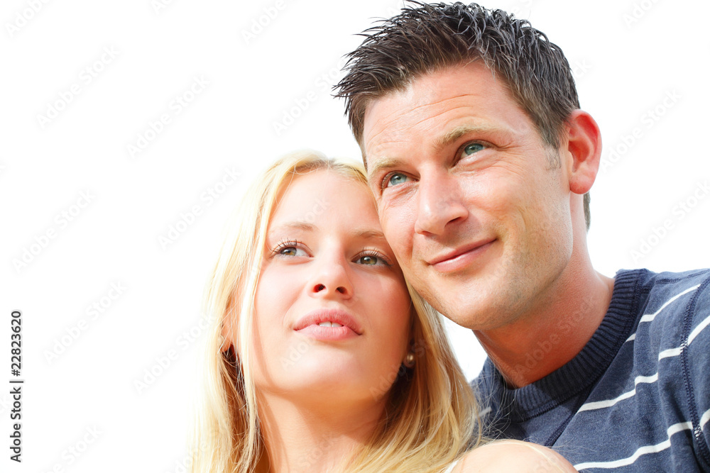 Close-up portrait of a young happy couple. Shallow DoF. Close-up portrait of a young happy couple. Shallow DoF.