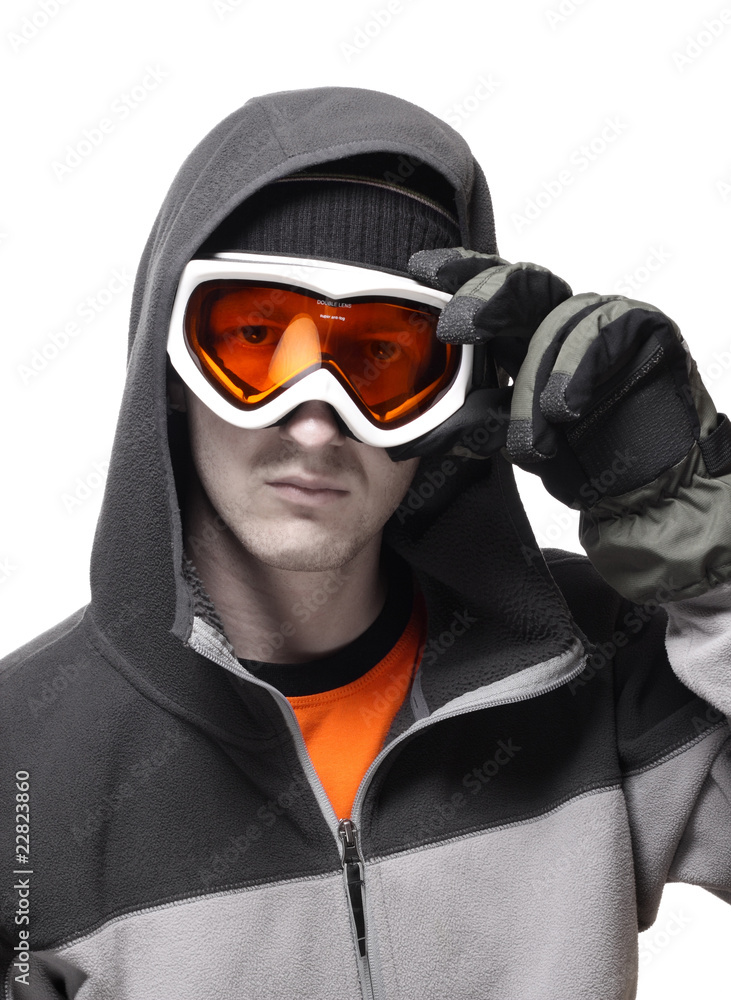 Portrait of snowboarder setting orange glasses straight isolated