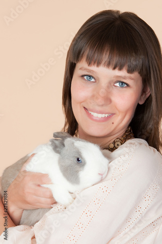 woman with a beautiful rabbit © Gelpi