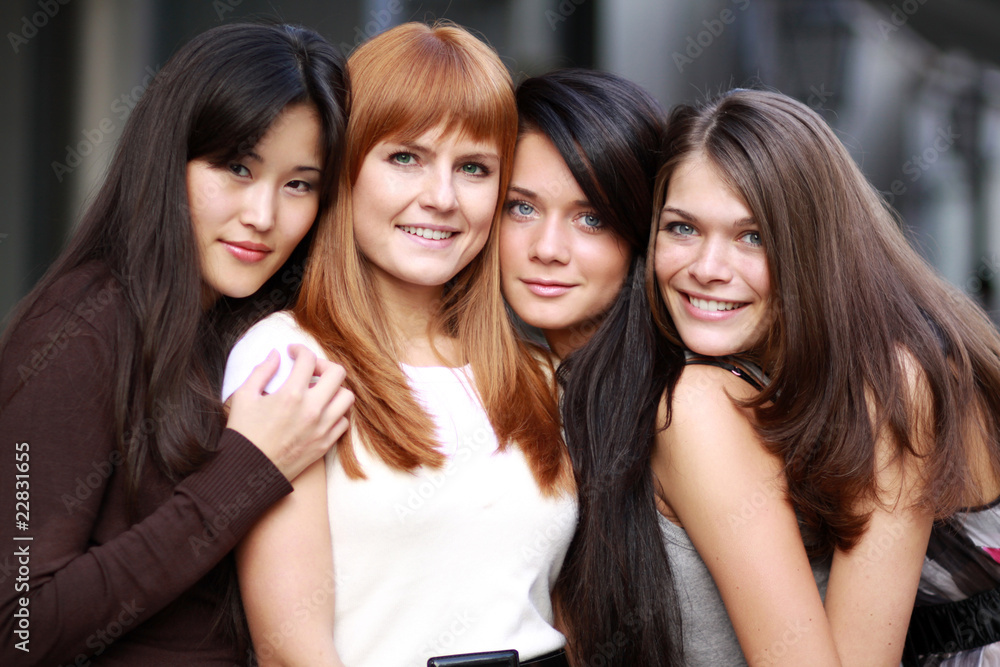 Close-up portrait of four urban women outside Close-up portrait of four urban women outside