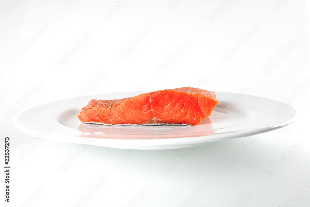 pink smoked salmon on white plate