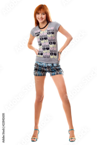 girl in a t-shirt and shorts. Isolated