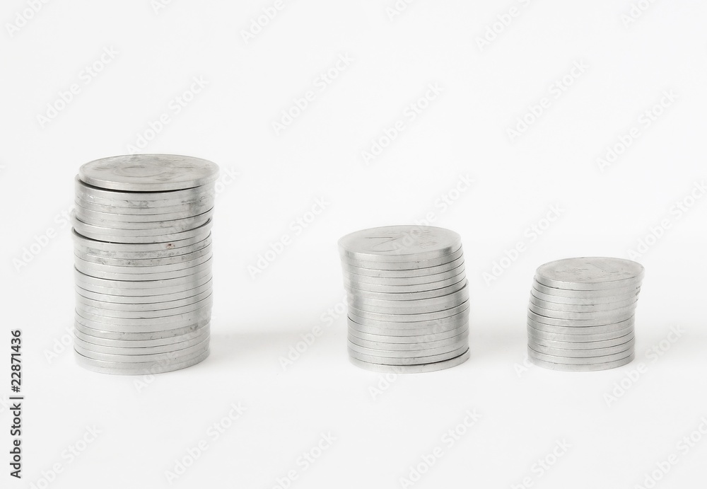Stacked Coins over white. Financial Gain theme Stacked Coins over white. Financial Gain theme