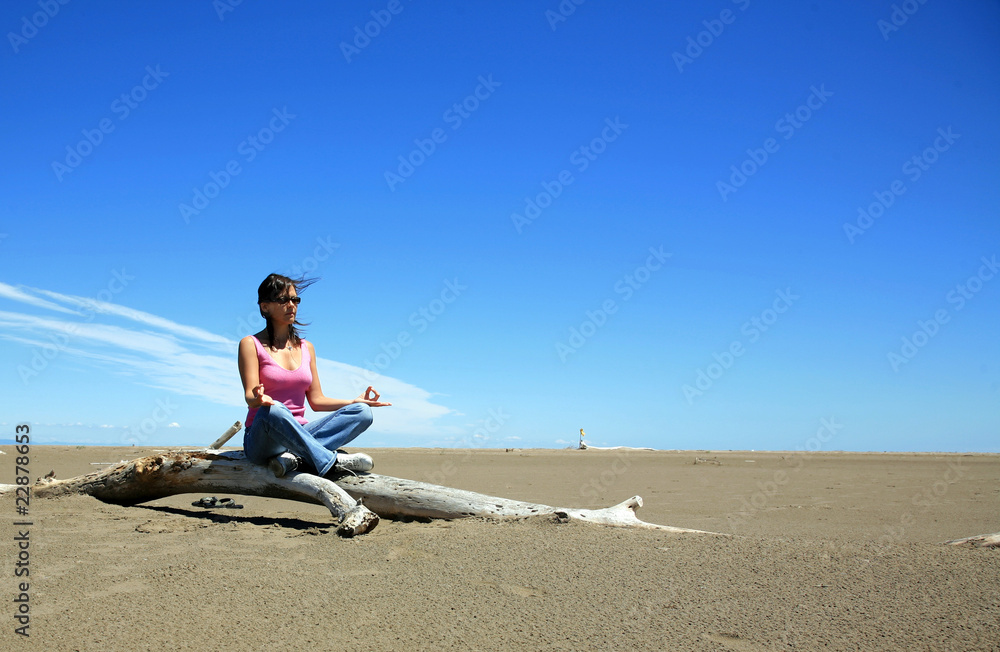 Meditating by the beach