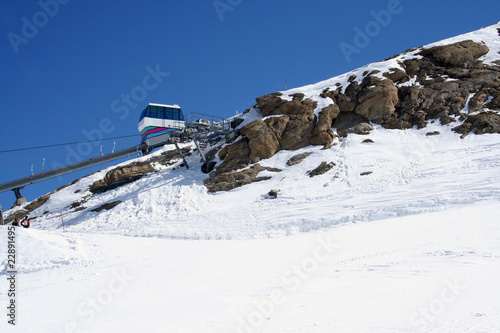 Ski lift on snowy mountainside