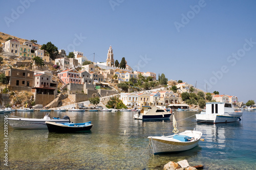 Small boats in bay of Symi island, Greece.