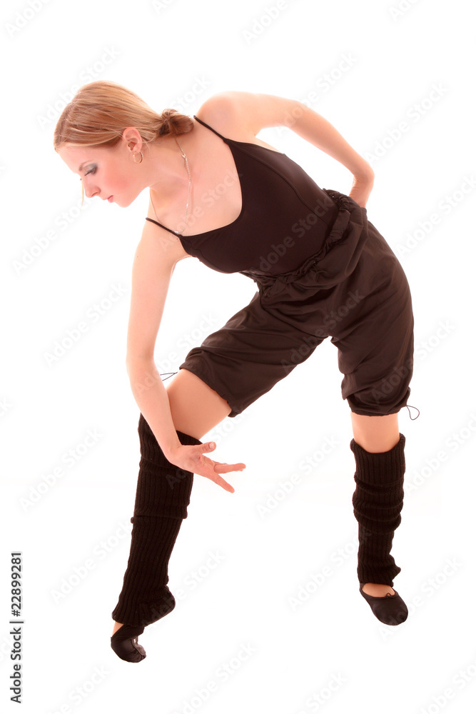 Young woman makes dancing exercise isolated on white Young woman makes dancing exercise isolated on white