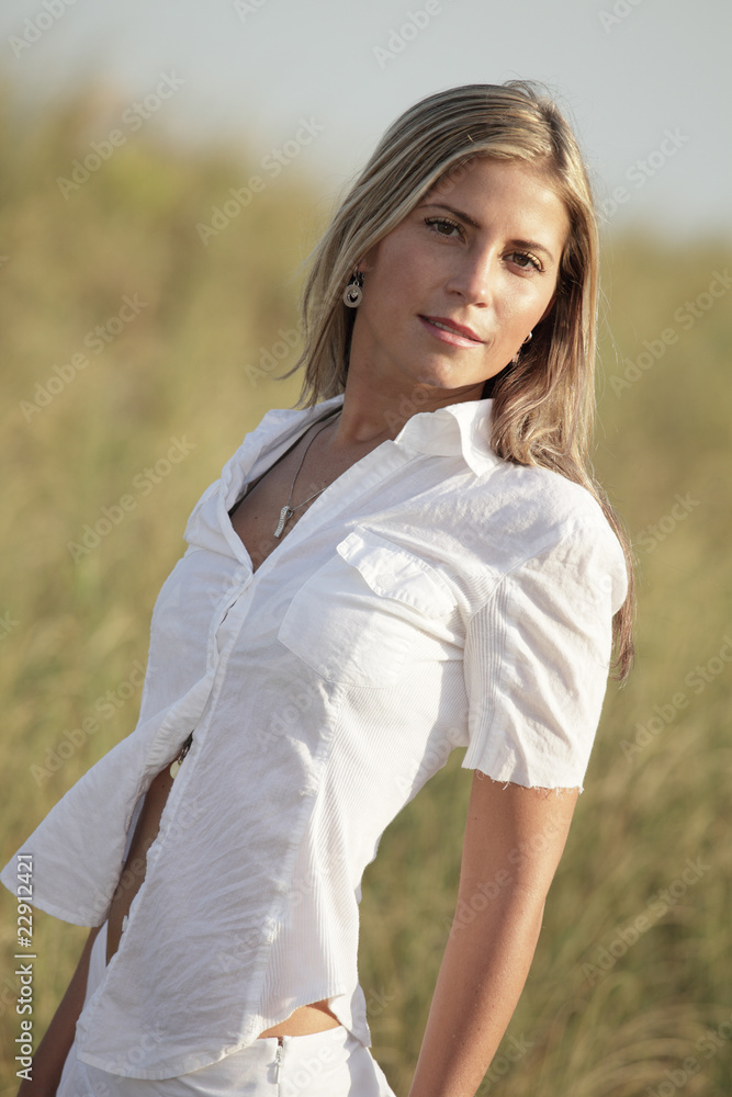 Stock photo of a young blond hair girl in nature Stock photo of a young blond hair girl in nature