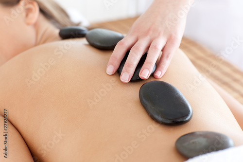 Close-up of a woman relaxing on a massage table