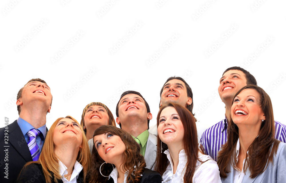 portrait of many men and women smiling and looking upwards