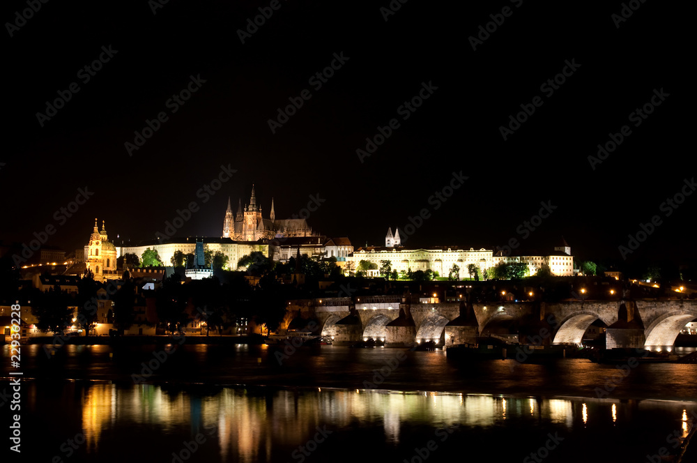 View on Charle`s bridge and St. Vitus Cathedral at night.