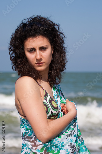young woman wearing swimsuit at the seaside