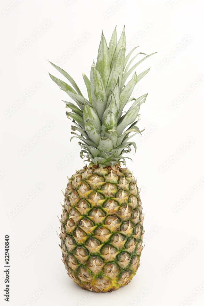 Fototapeta premium Pineapple with leaves on a white background