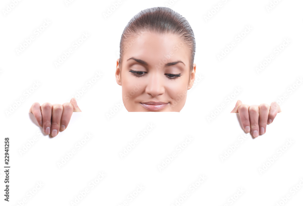 female holding billboard and looking down female holding billboard and looking down