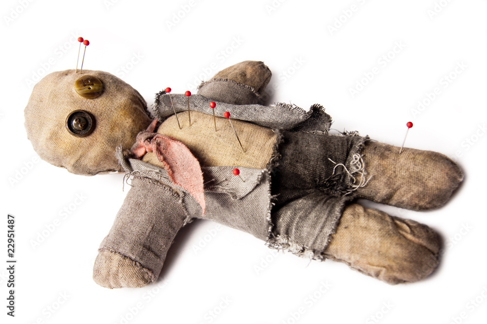 Photo of Businessman voodoo doll laying on white - obrazy, fototapety, plakaty 