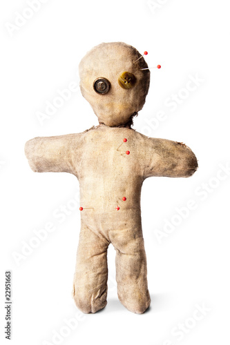 creepy voodoo doll with needles isolated on white