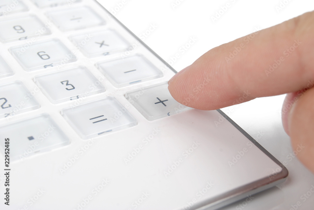 finger on calculator finger on calculator