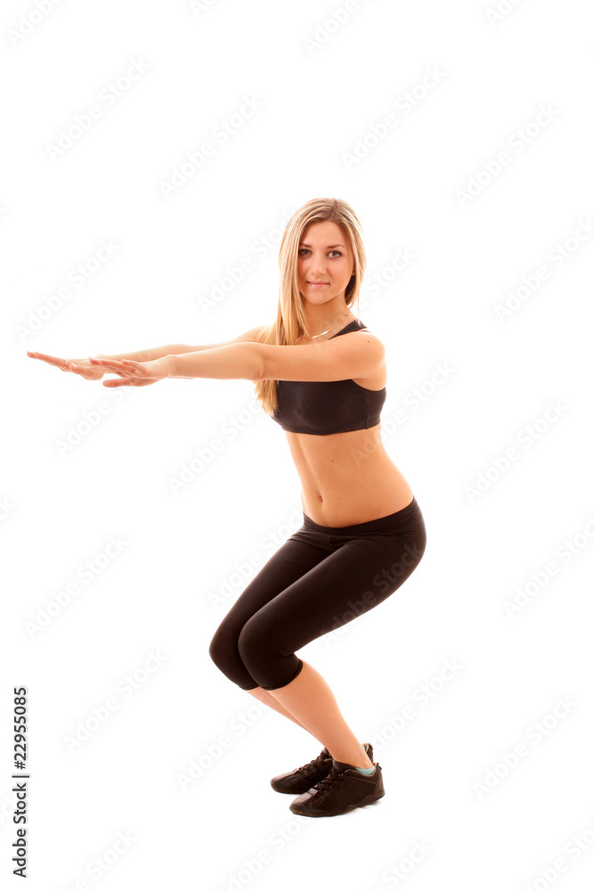 pretty young girl in the gymnastic pose  isolated on white