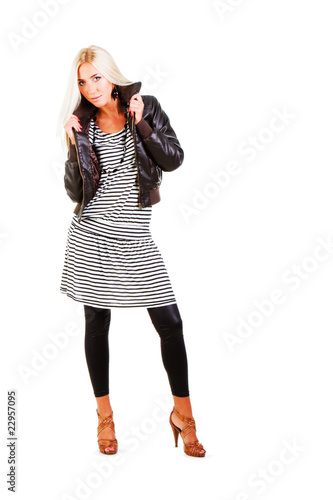 Young sweet girl in jacket and dress