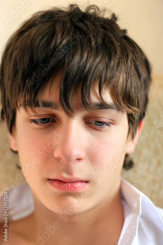 sad teenager portrait close up